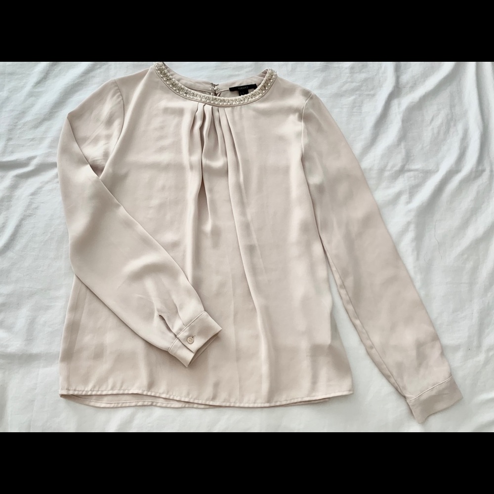Blouse with beaded neck